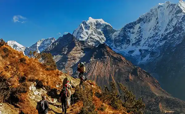 Hikers traversing a path in Khumbu Sagarmatha National Park, the Himalayas, Nepal
