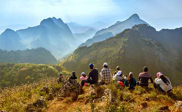 Group of trekkers resting at Doi Luang mountain at Chiang Dao near Chiang Mai