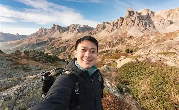 Male hiker taking a selfie in the Pyrenees