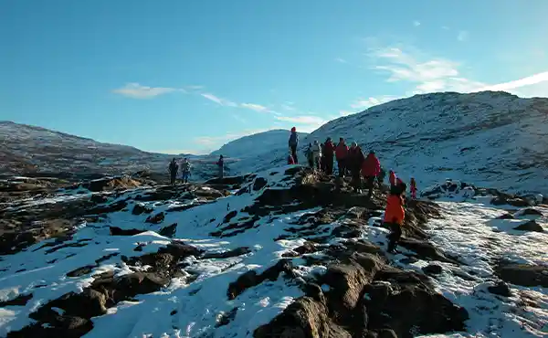 A group of hikers in Scoresby Sound, Greenland.